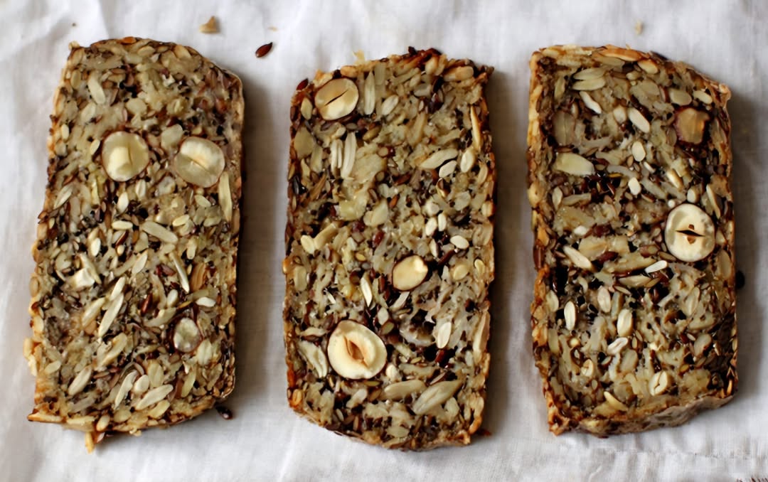 Photo by Asatoma_Conscious Food Choices on March 01, 2026. May be an image of rye bread, almonds, granola, baked goods, toast and text.